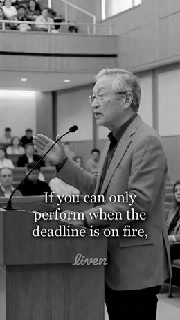 Animated GIF of the opening seconds of Liven's most-viewed ad: a man speaking at a lectern in a lecture hall, with the serif subtitle If you can only perform when the deadline is on fire